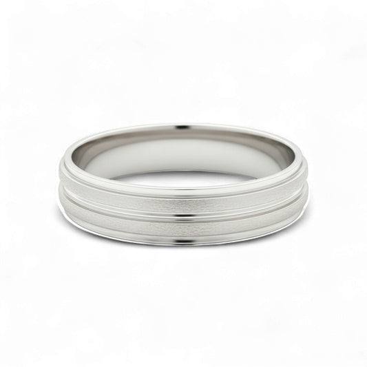 Silver ring with a textured band on a white background