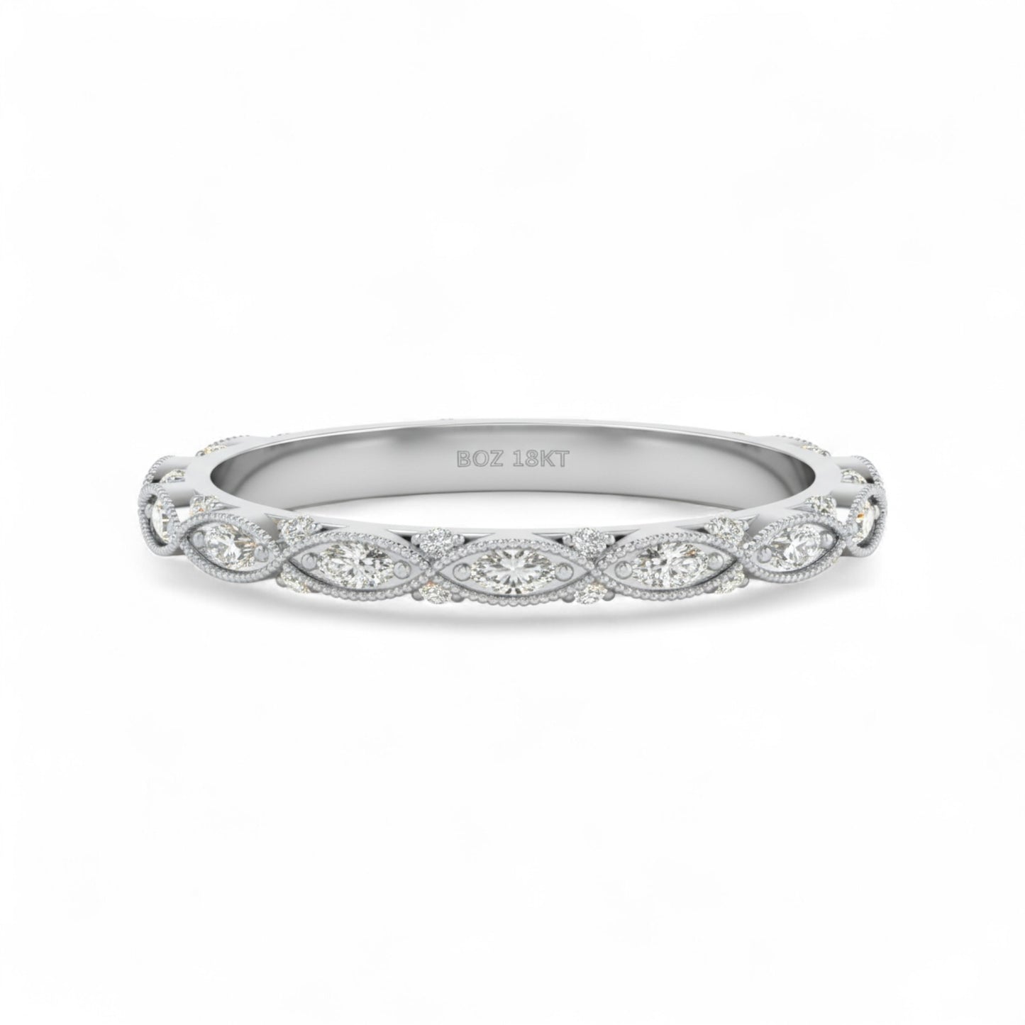 Silver ring with diamond accents on a white background