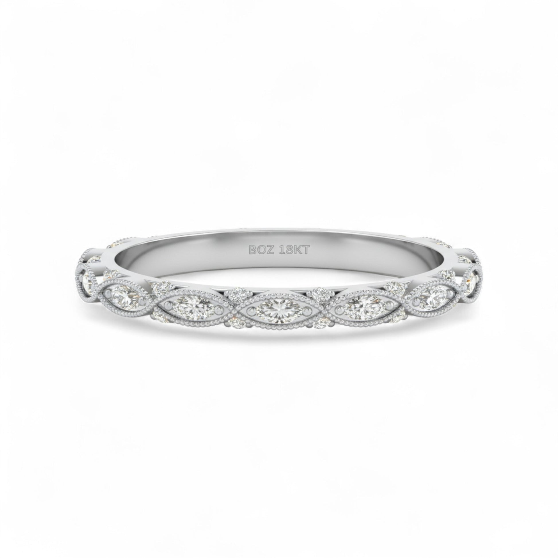 Silver ring with diamond accents on a white background