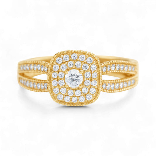 Gold ring with diamond accents on a white background
