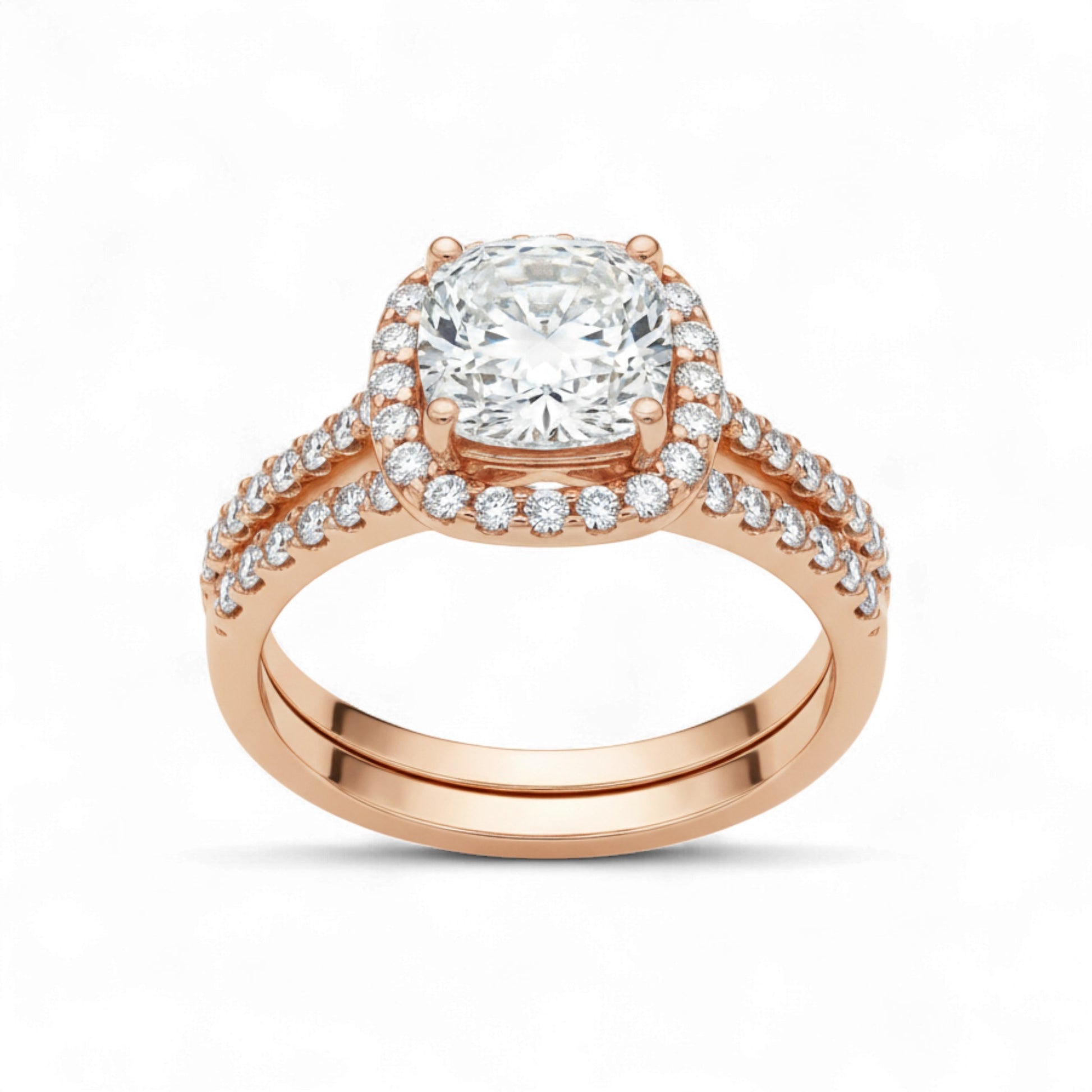 Rose gold ring with a large diamond and smaller diamonds on the band against a white background