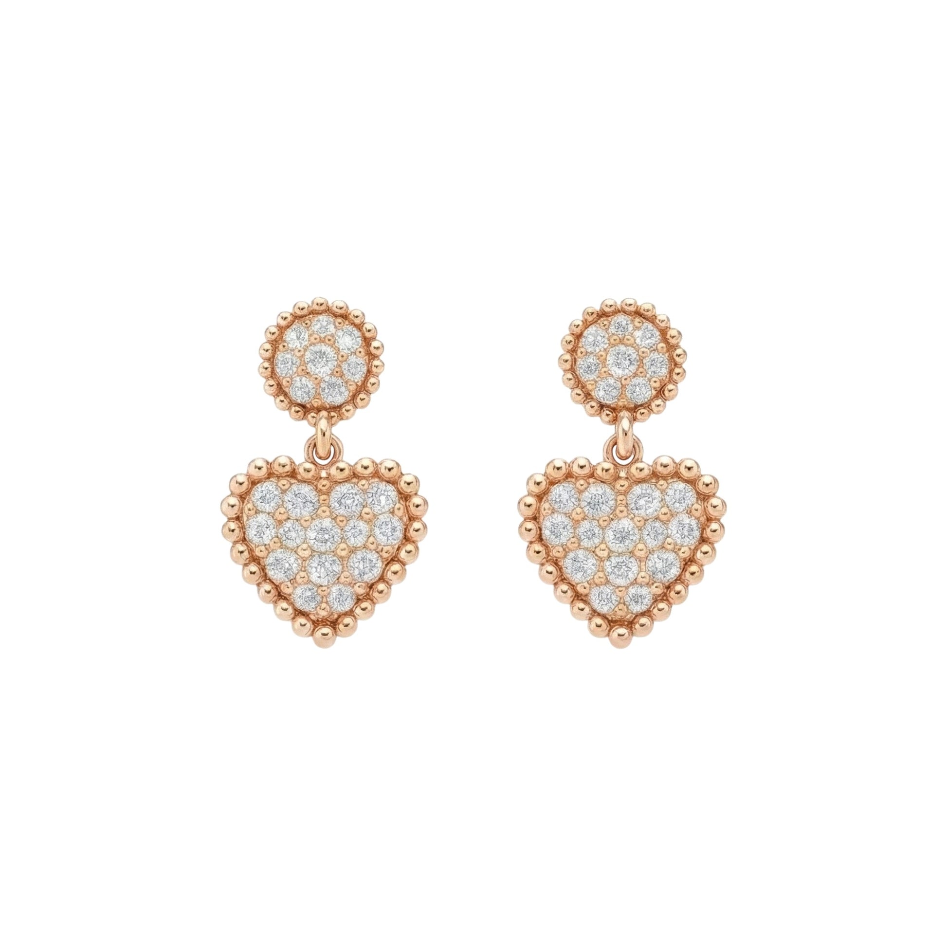 Rose gold heart-shaped earrings with diamond accents on a white background