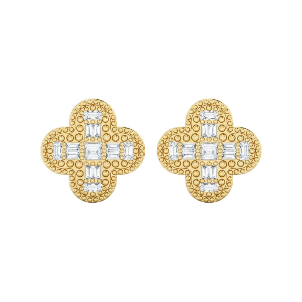 Gold earrings with diamond accents on a white background