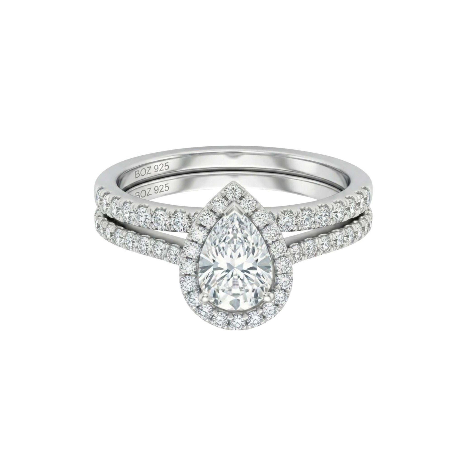 Classic pear cut moissanite bridal ring set in 925 sterling silver with pavé accents