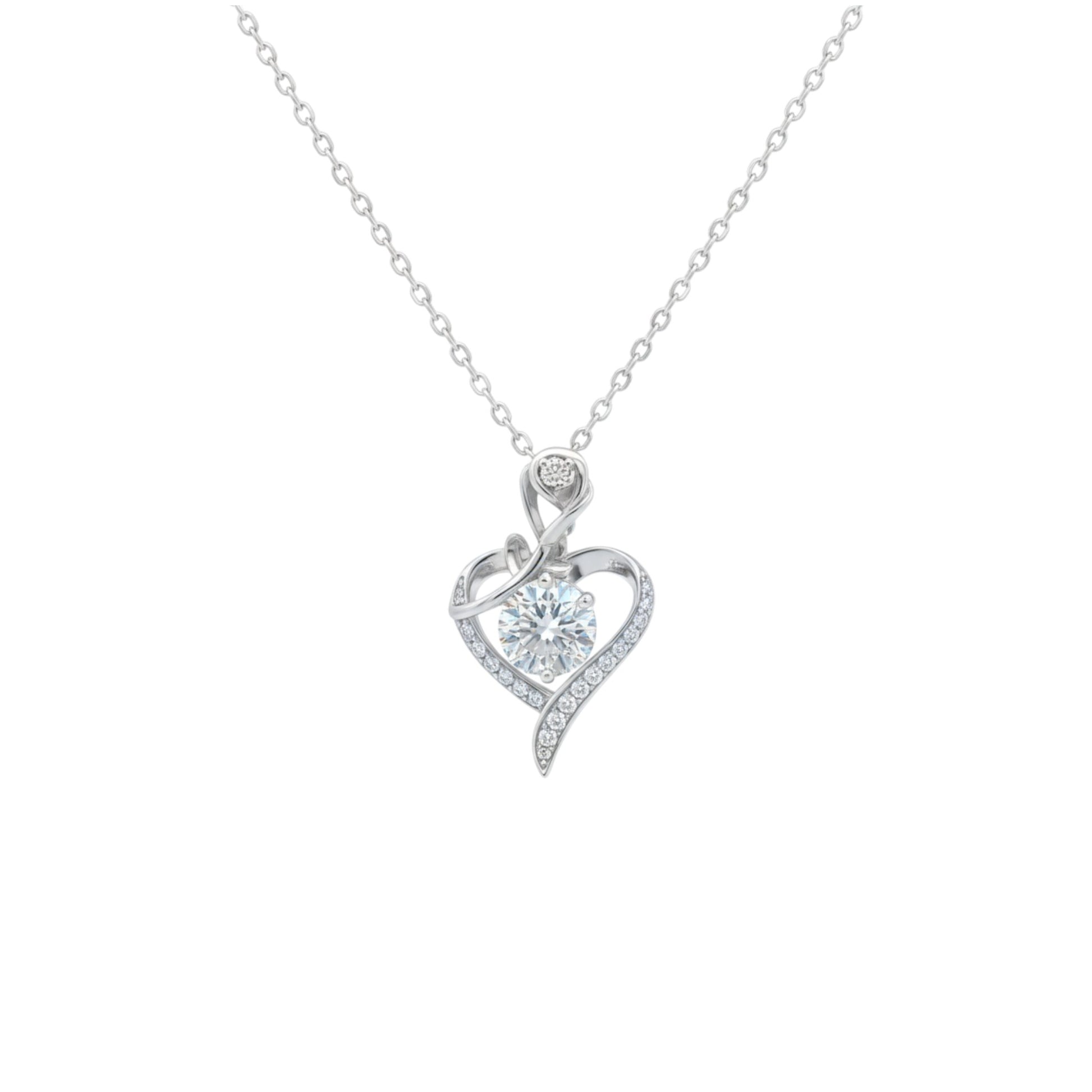 Heart-shaped diamond pendant on a white background
