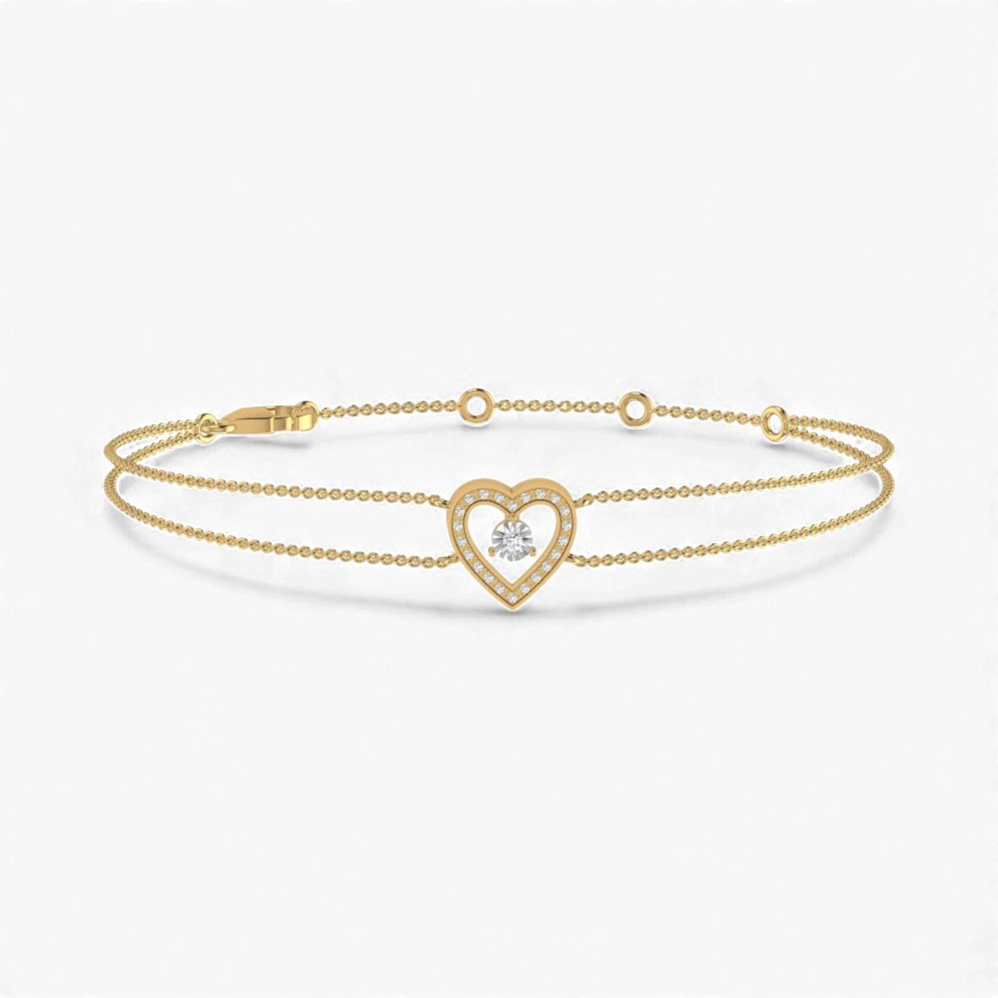 Gold bracelet with a heart-shaped clasp on a white background