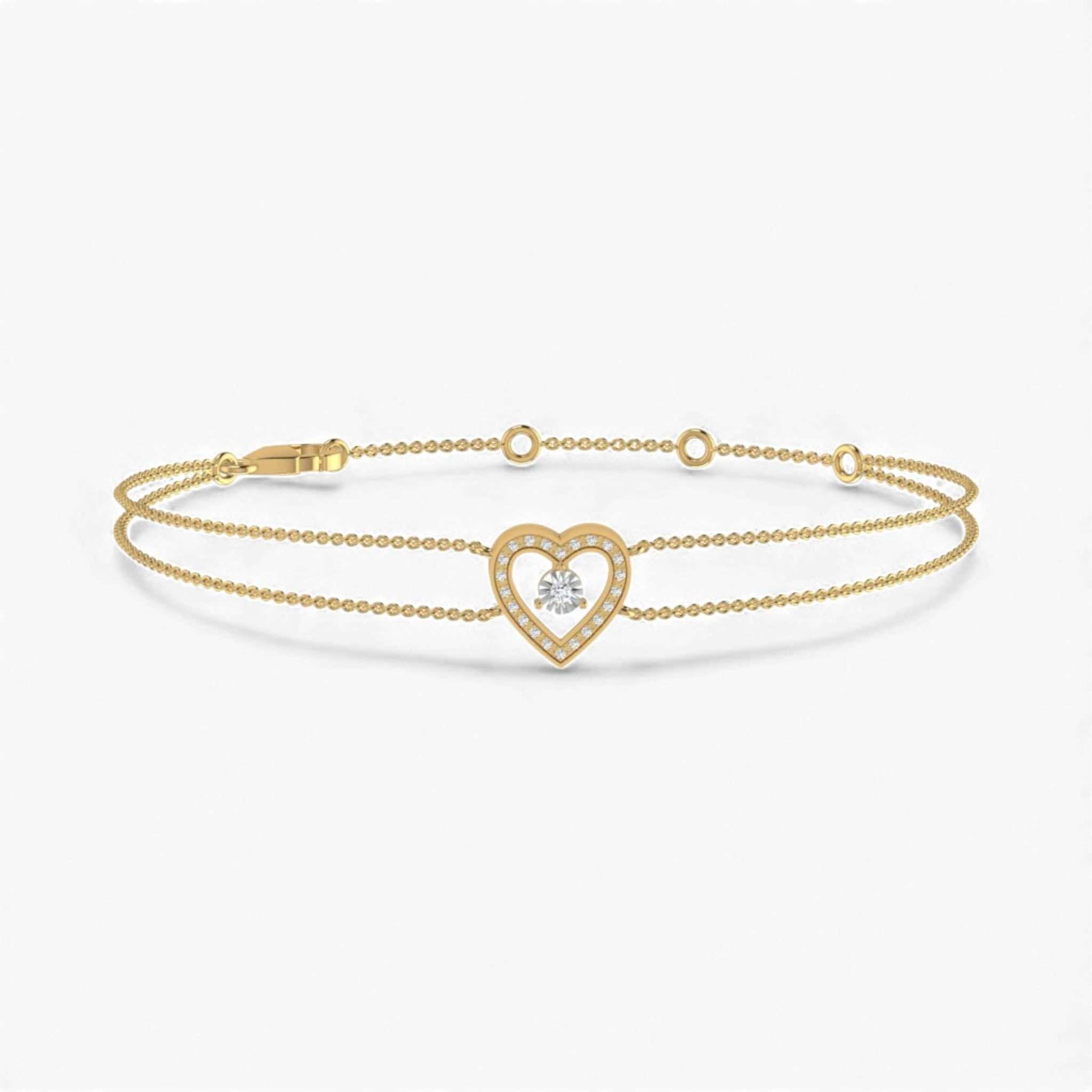 Gold bracelet with a heart-shaped clasp on a white background