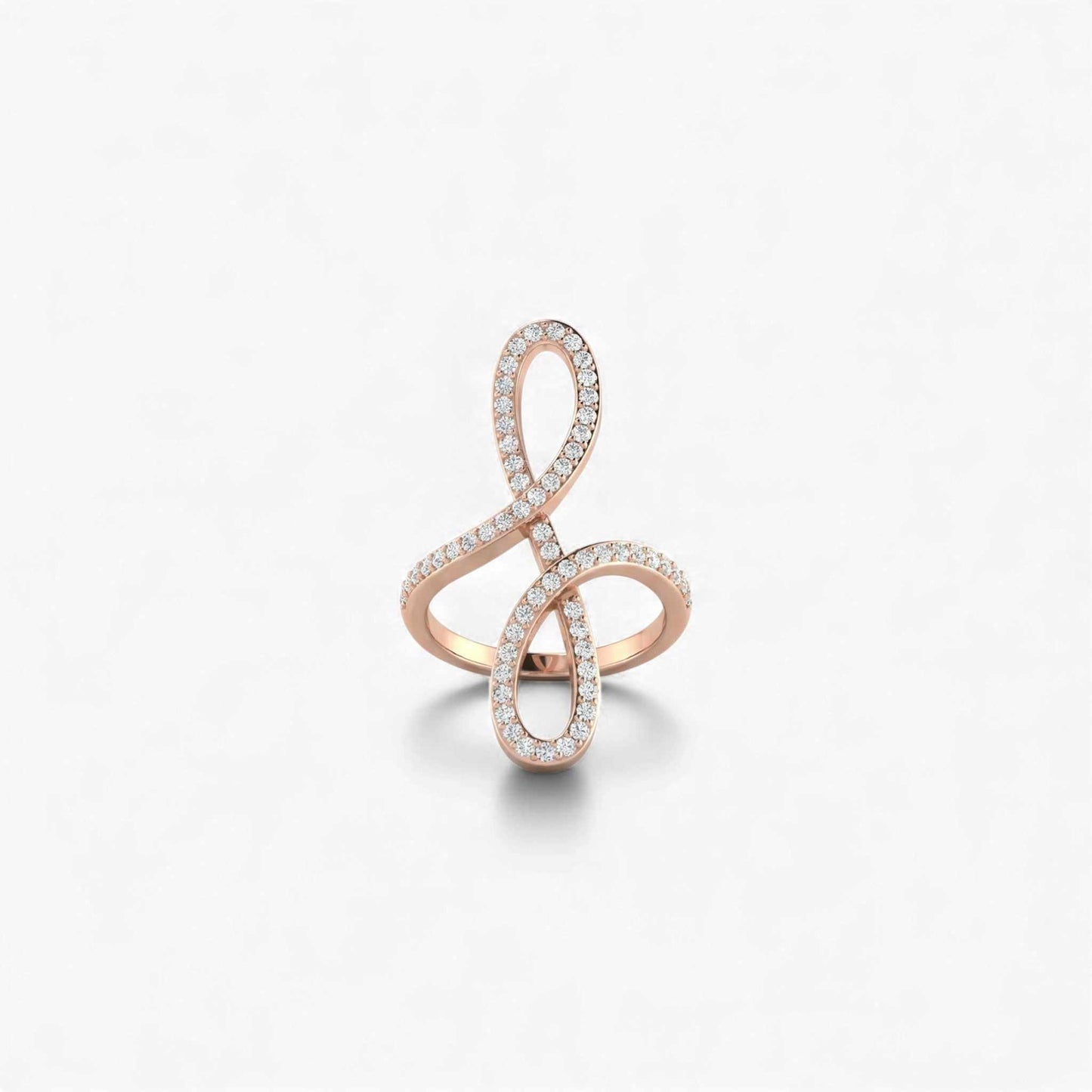 Rose gold ring with diamond accents on a light gray background