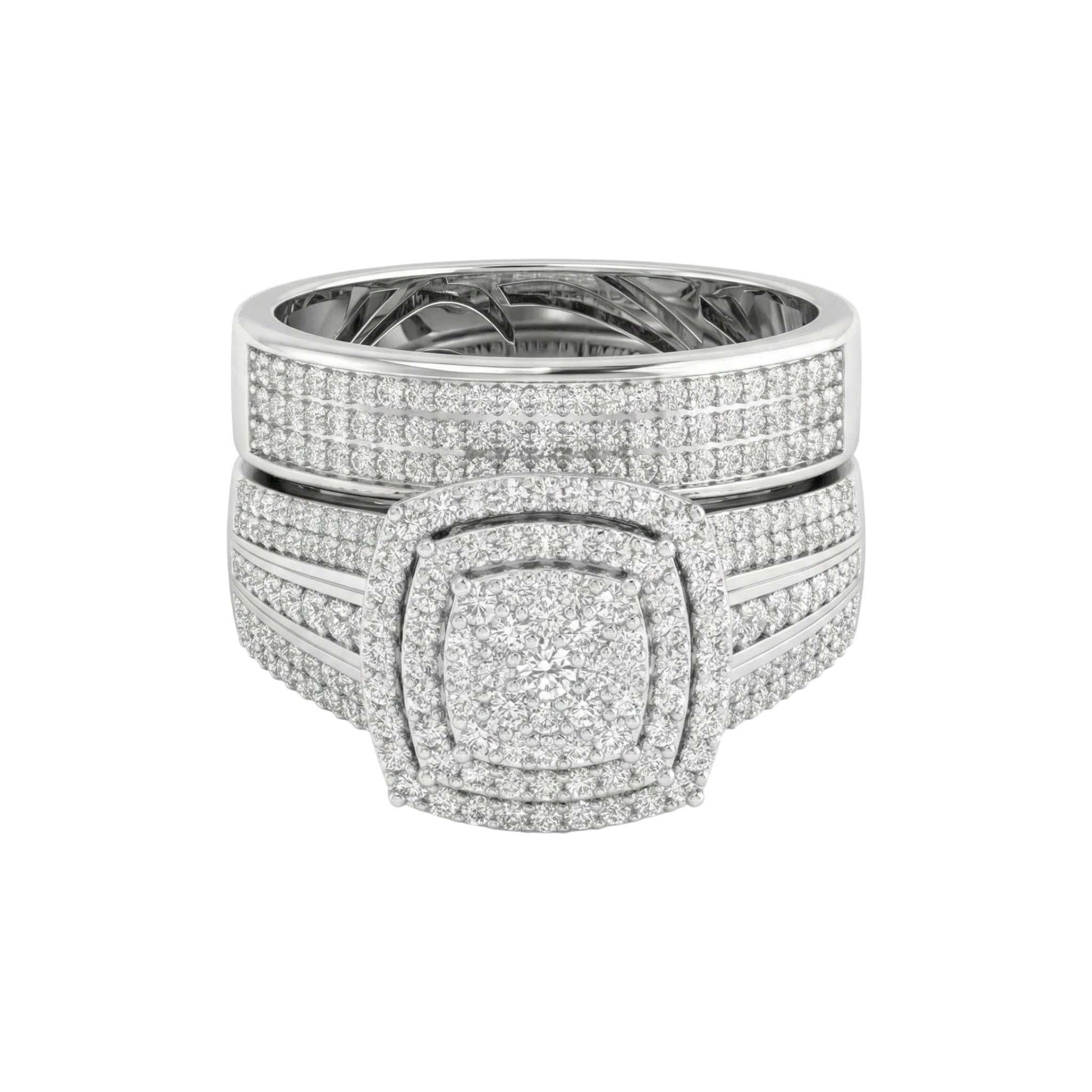 Stack of silver rings with diamond accents on a white background