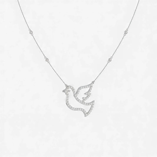 Silver dove-shaped pendant necklace on a white background