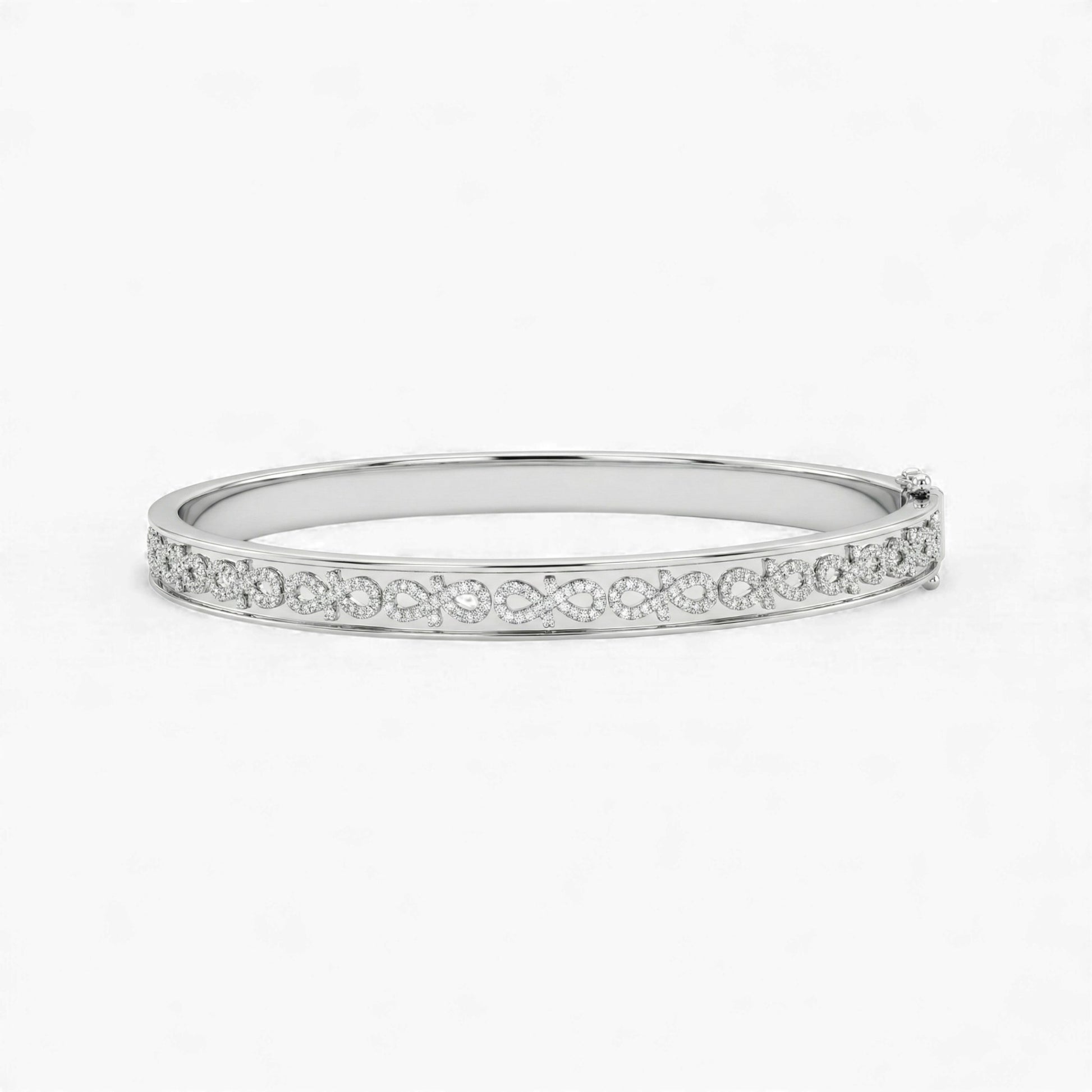 Silver bangle with small stones on a white background
