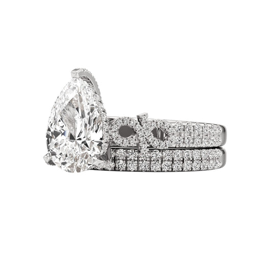 Diamond ring with a matching band on a white background