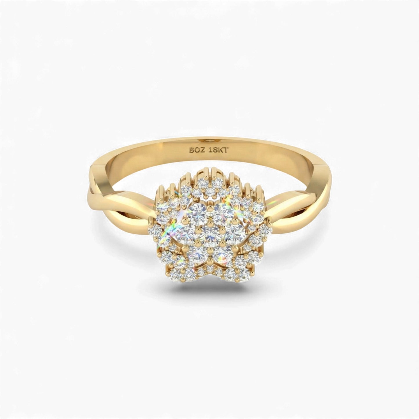 Gold ring with diamond cluster on a white background