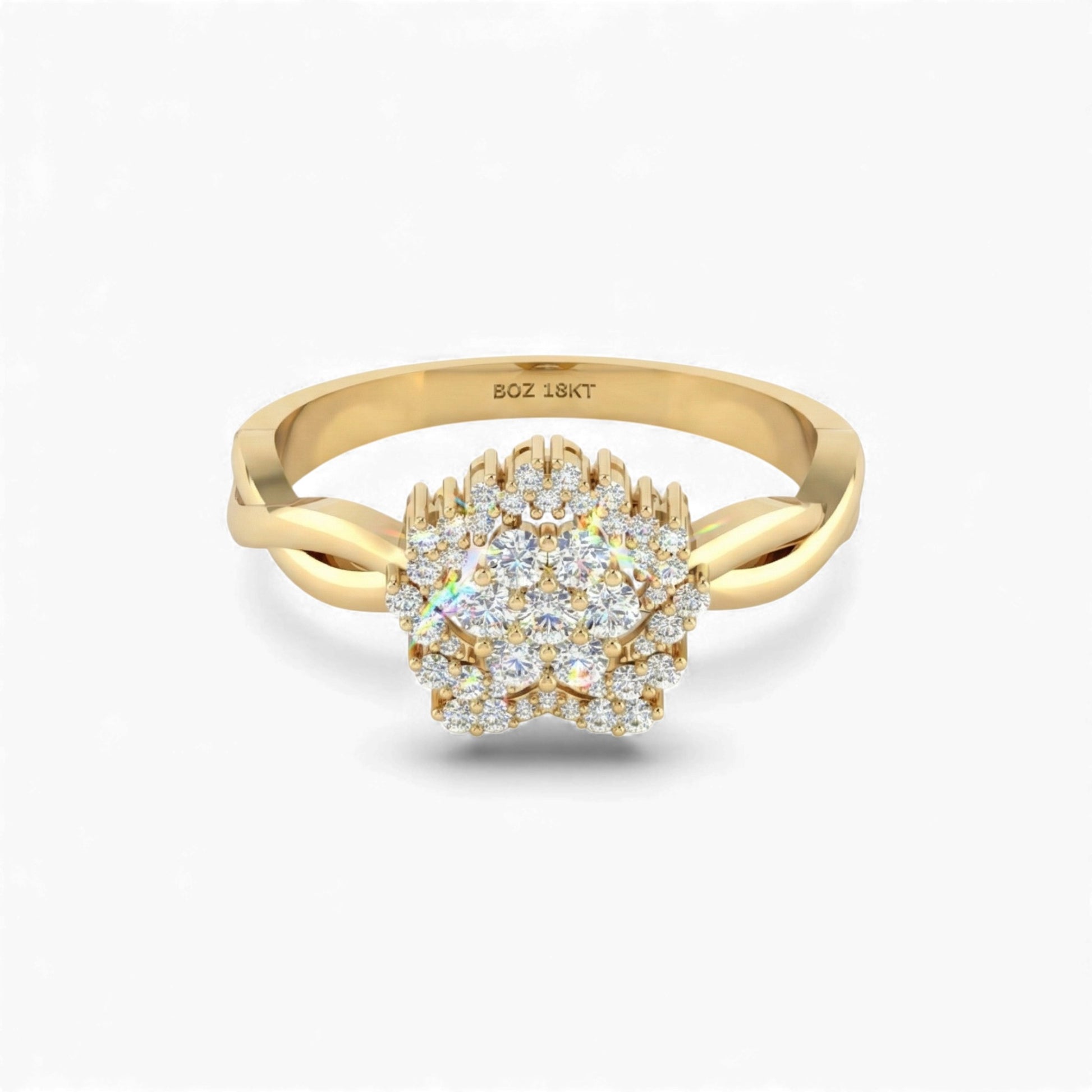 Gold ring with diamond cluster on a white background