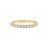 Gold ring with diamonds on a white background