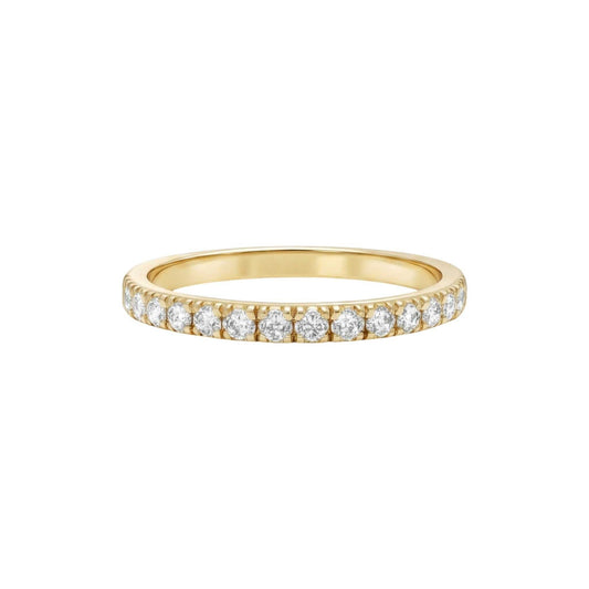 Gold ring with diamonds on a white background