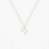 Gold necklace with a pendant shaped like the African continent on a light gray background