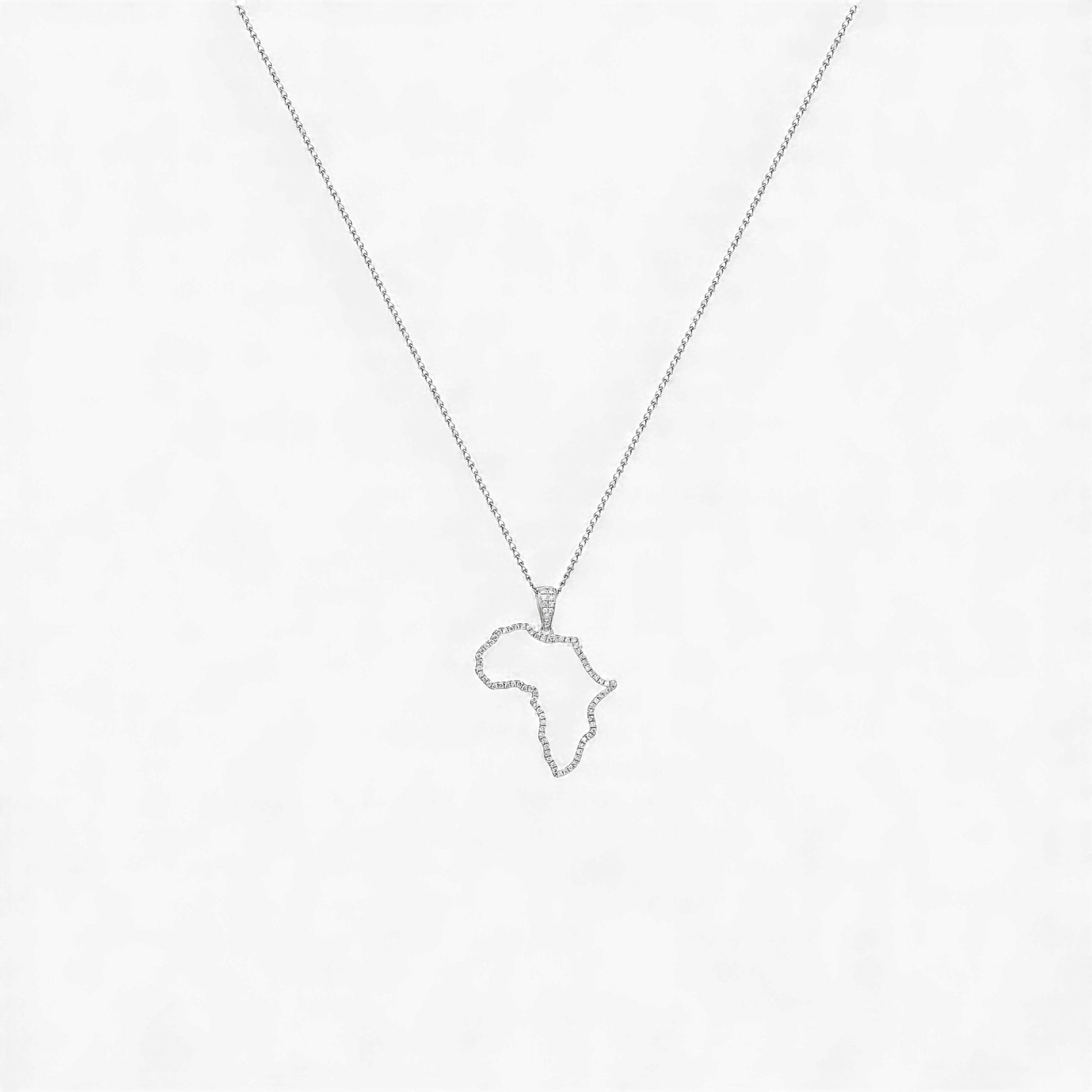 Necklace with a pendant shaped like the continent of Africa on a white background