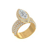 Gold ring with a large central diamond and smaller diamonds on a white background