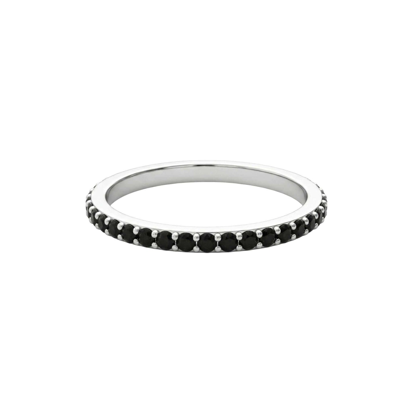 Silver ring with black gemstones on a white background