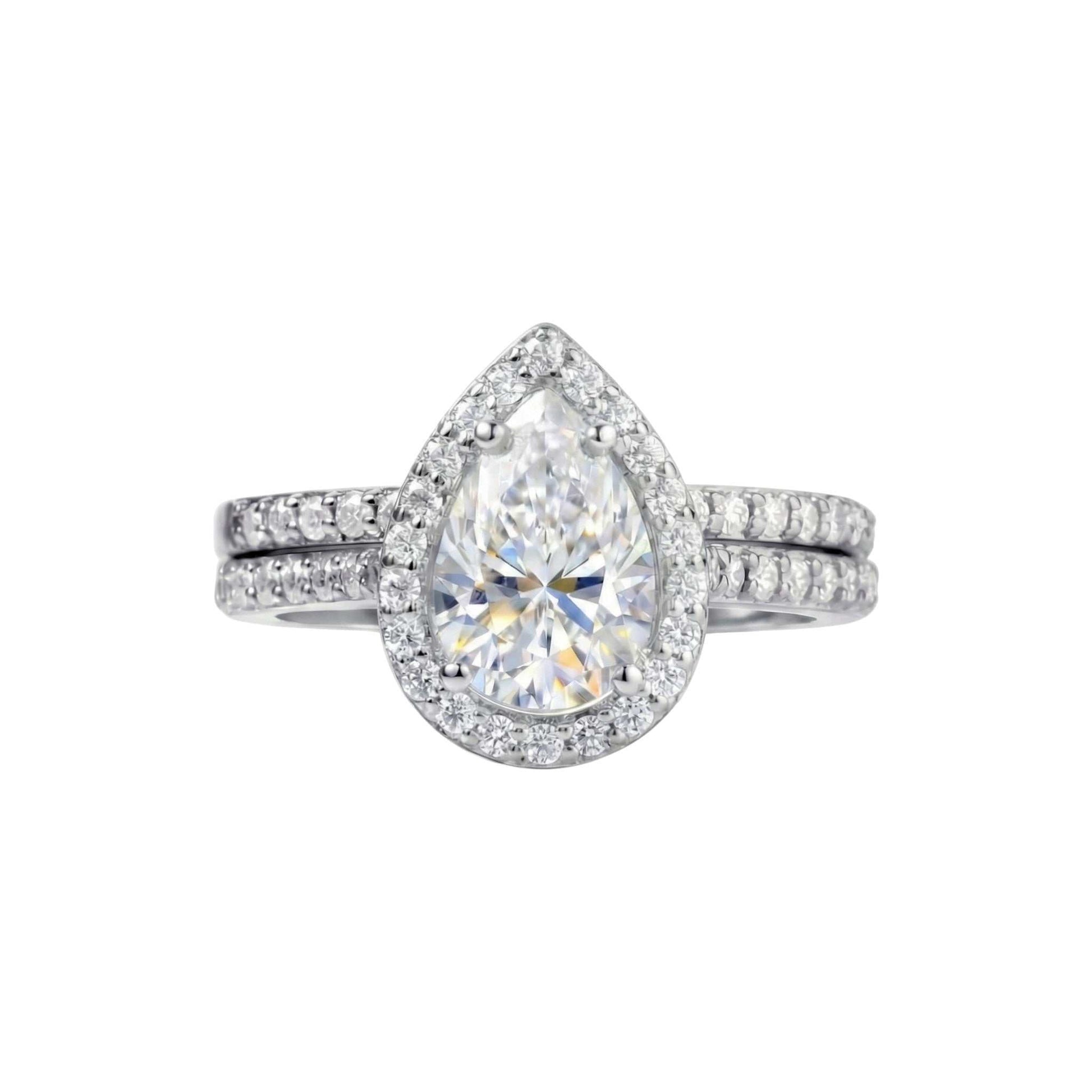 Classic Pear Cut CZ Bride Set sterling silver engagement ring with pear-shaped cubic zirconia centerpiece