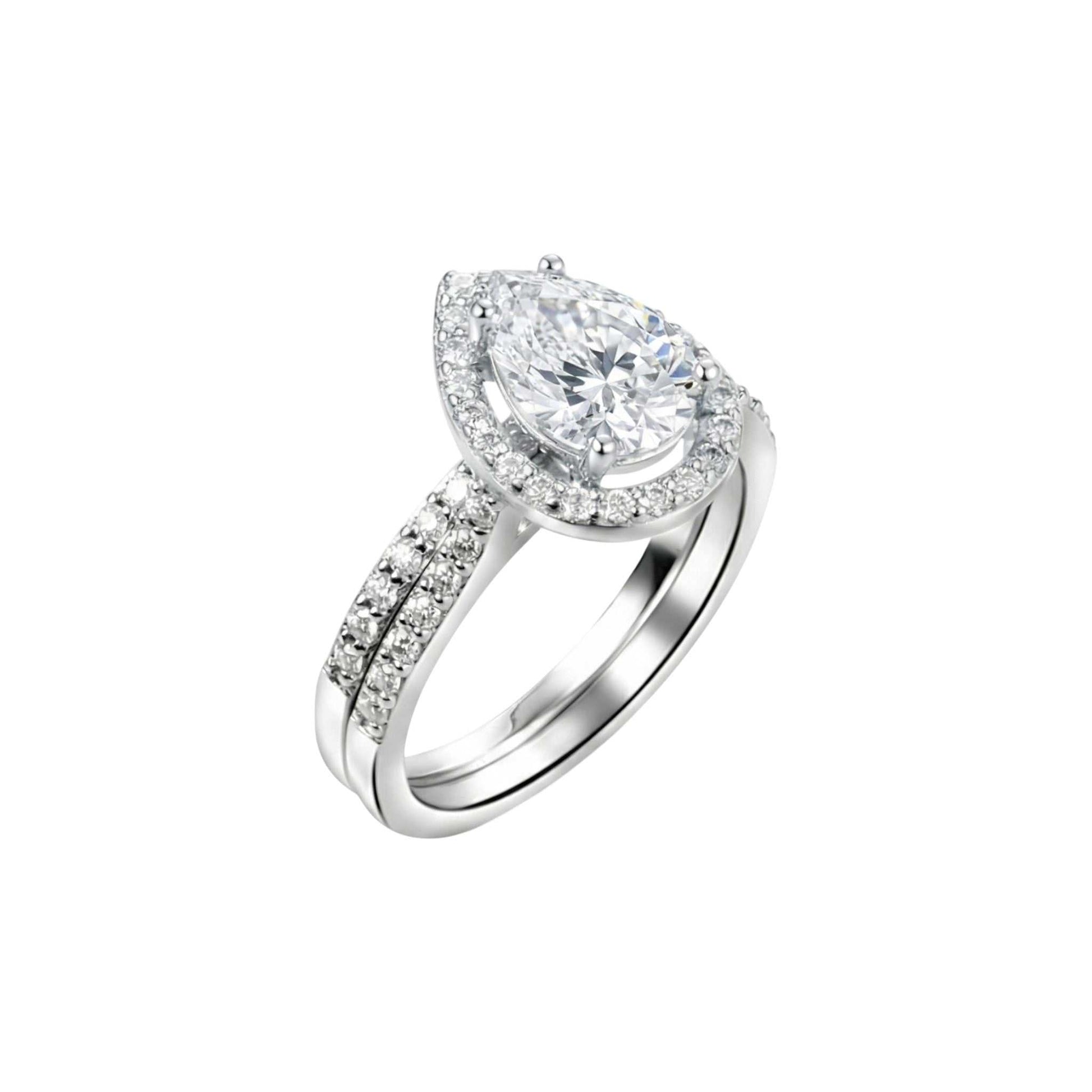 Diamond ring with a pear-shaped center stone on a white background