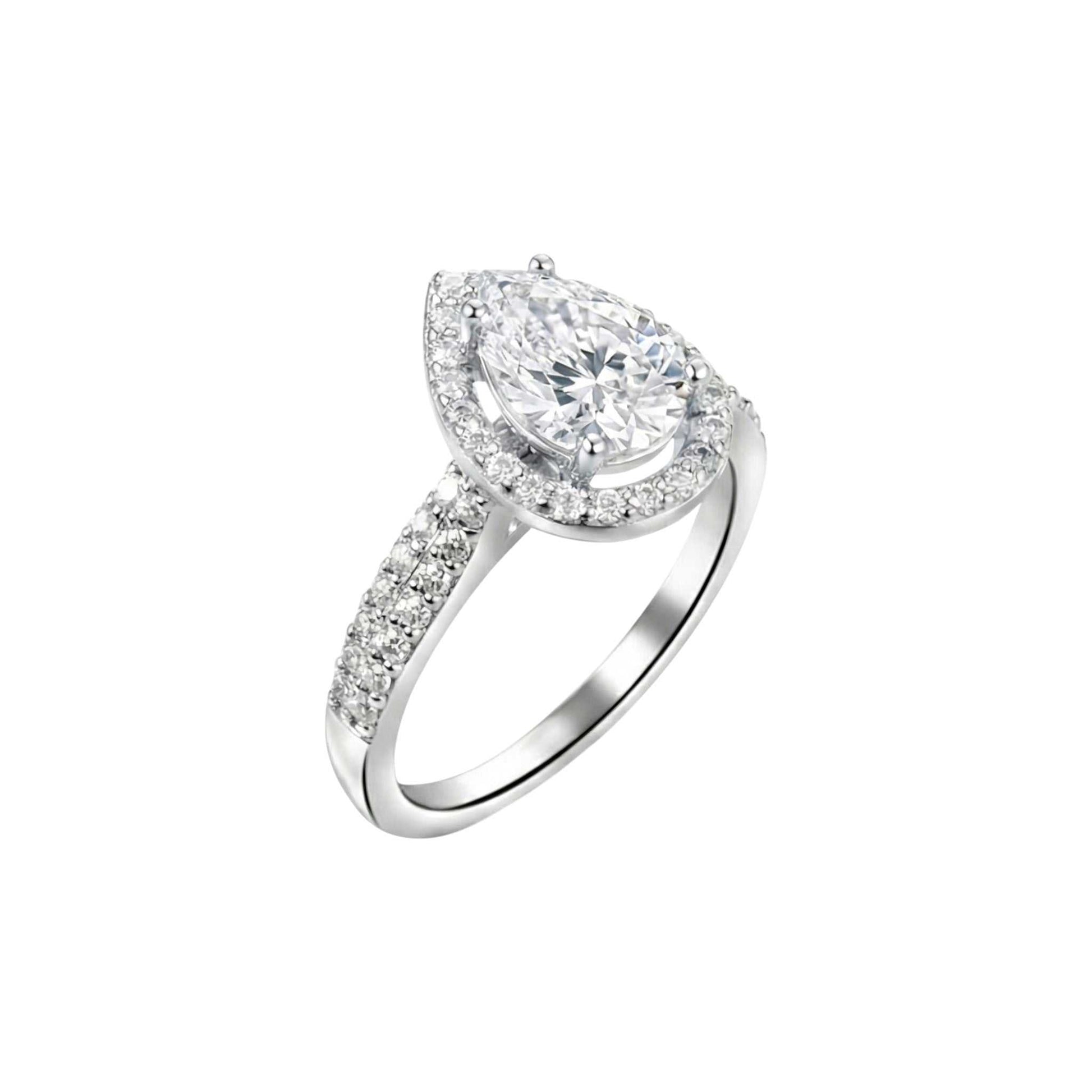 Diamond ring with pear-shaped center stone on a white background