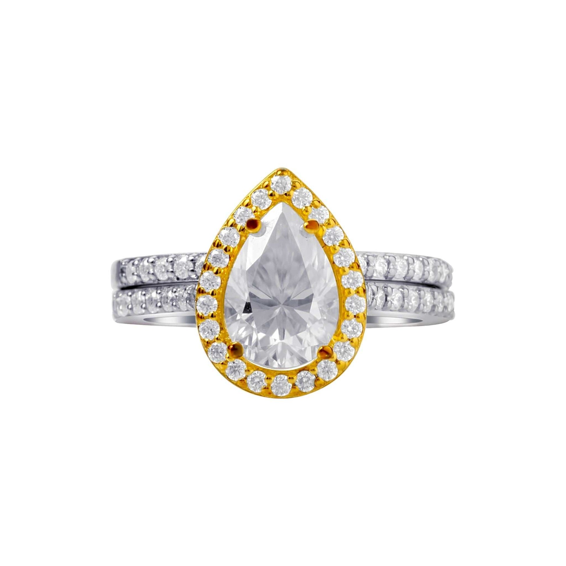 Pear cut moissanite bridal set in two-tone 925 sterling silver with gold halo and pavé band