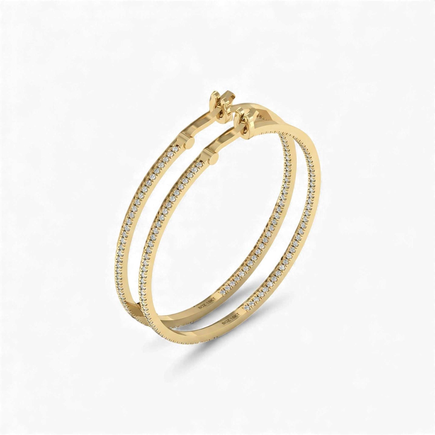 Gold bracelet with diamond accents on a white background