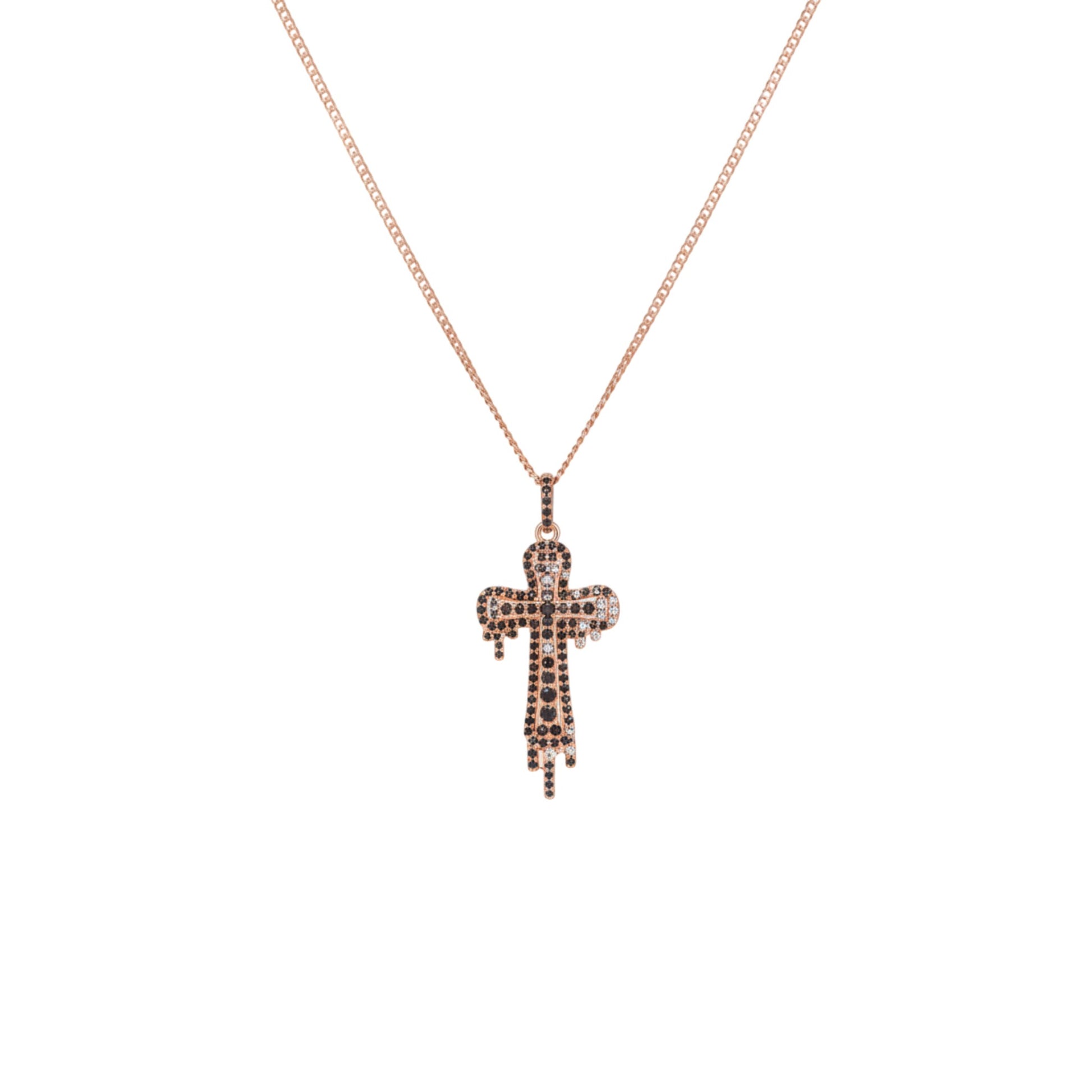 Rose gold cross necklace with small stones on a white background