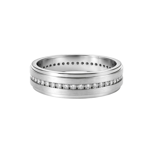Silver ring with diamond accents on a white background