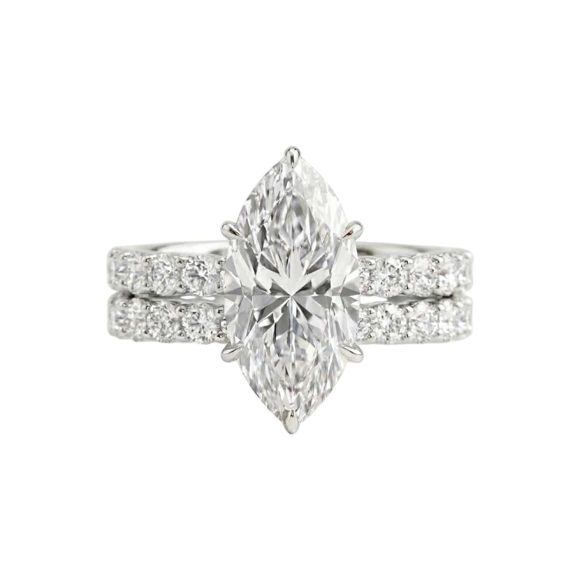 Diamond ring with pear-shaped center stone on a white background