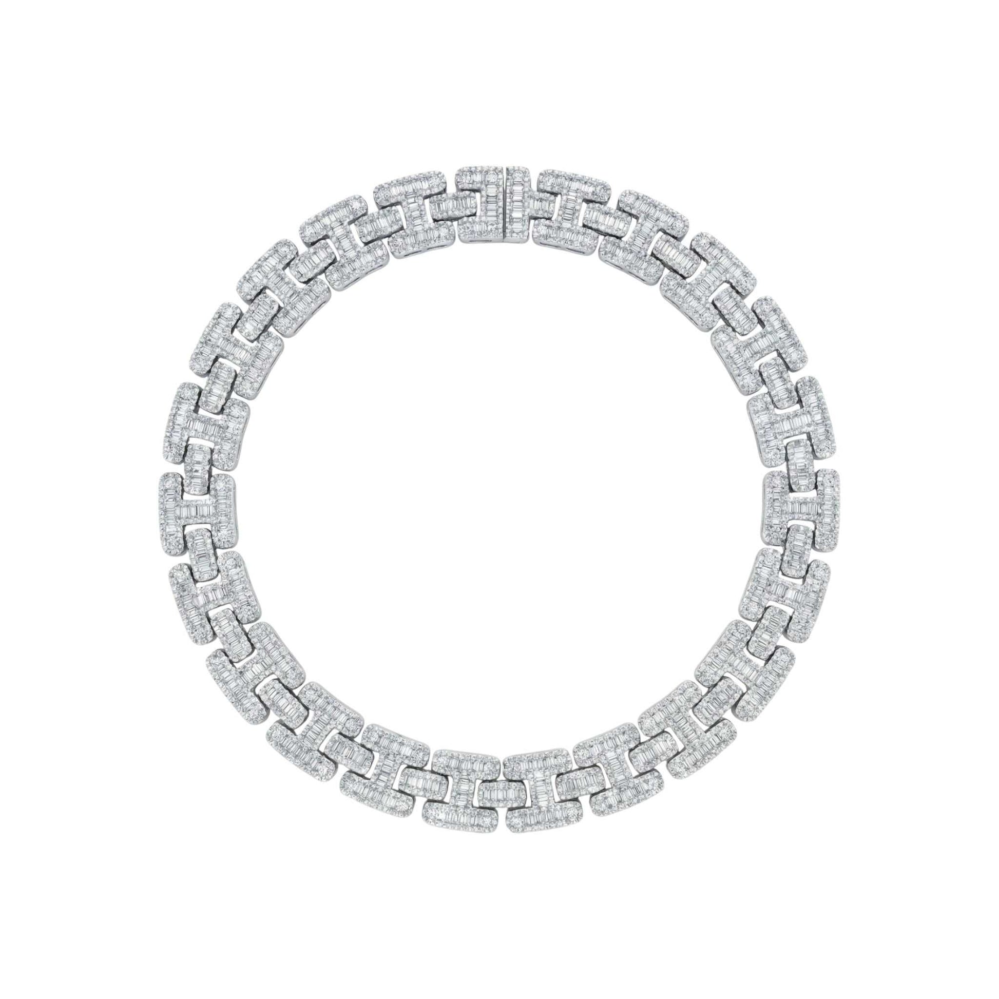 Silver bracelet with a chain design on a white background