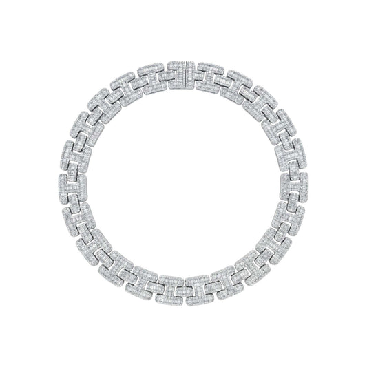 Silver bracelet with a chain design on a white background