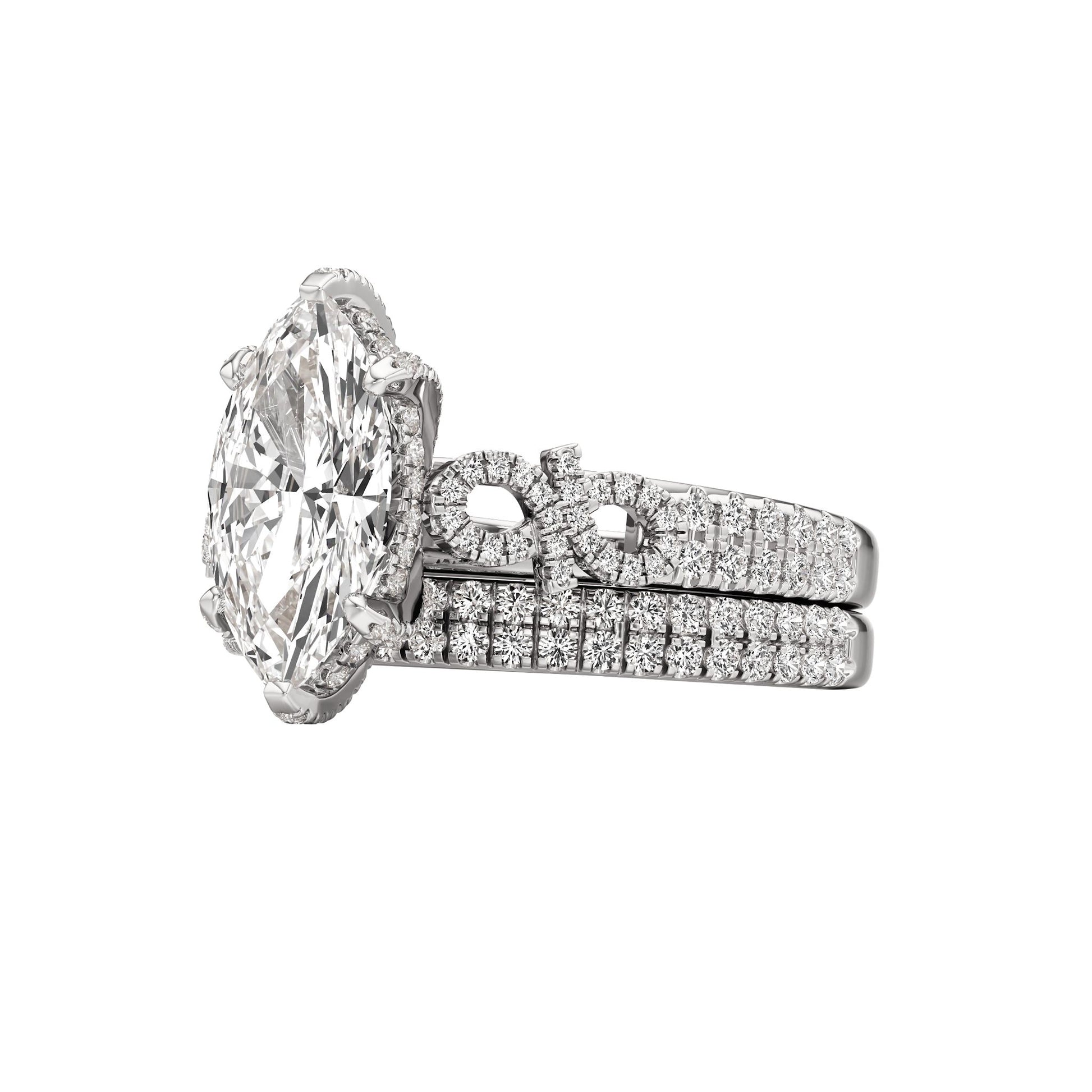 Diamond ring with a matching band on a white background