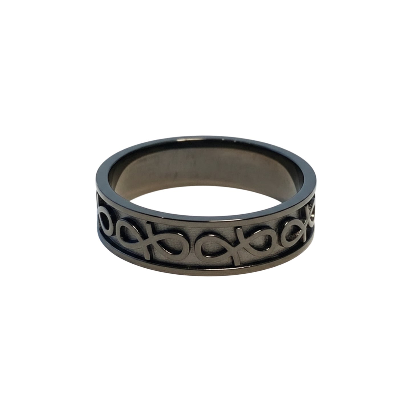 Black ring with intricate design on a white background