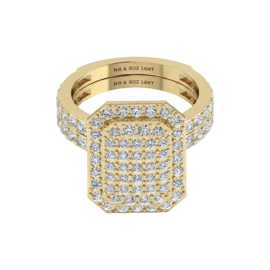 Gold ring with diamond accents on a white background