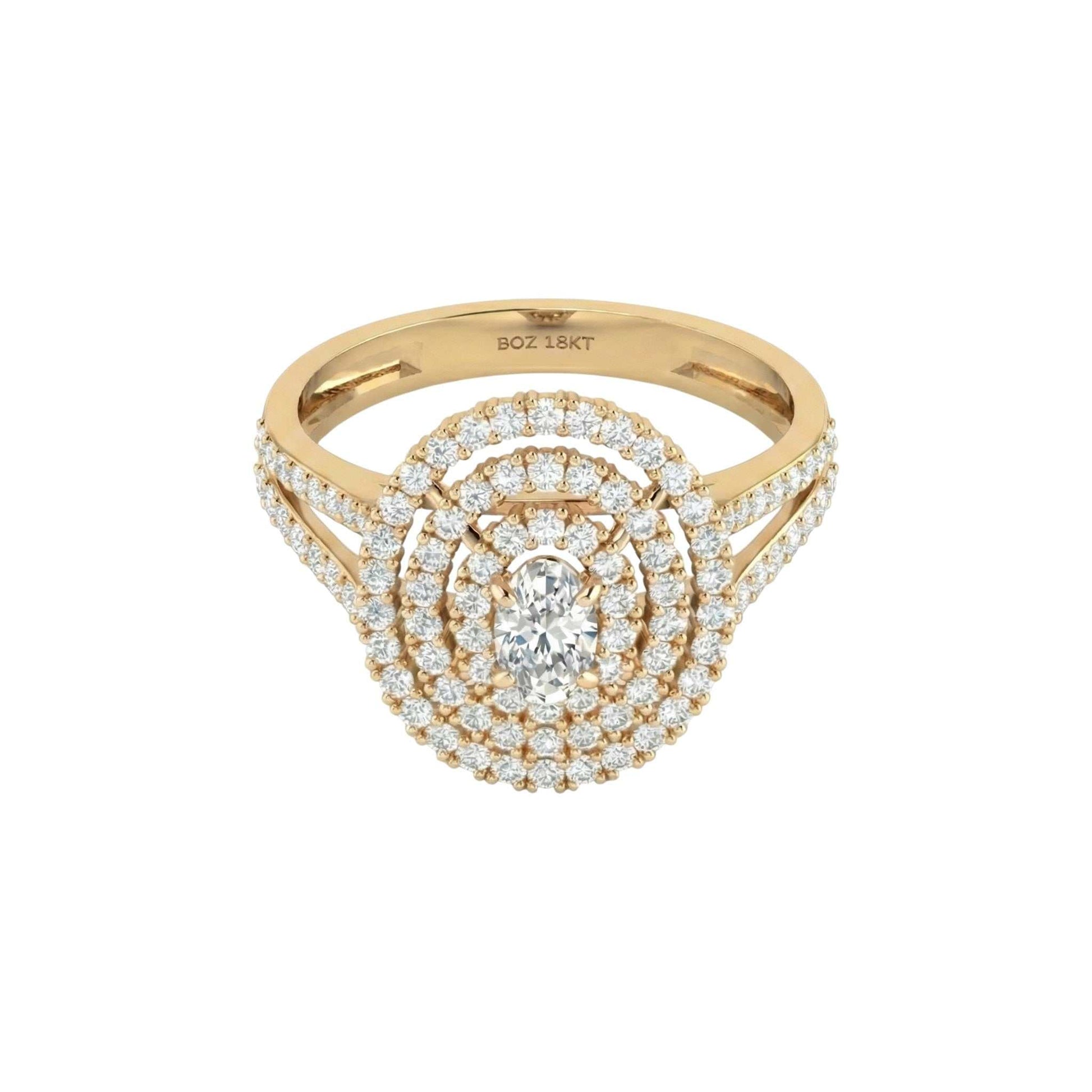 Gold ring with diamond accents on a white background
