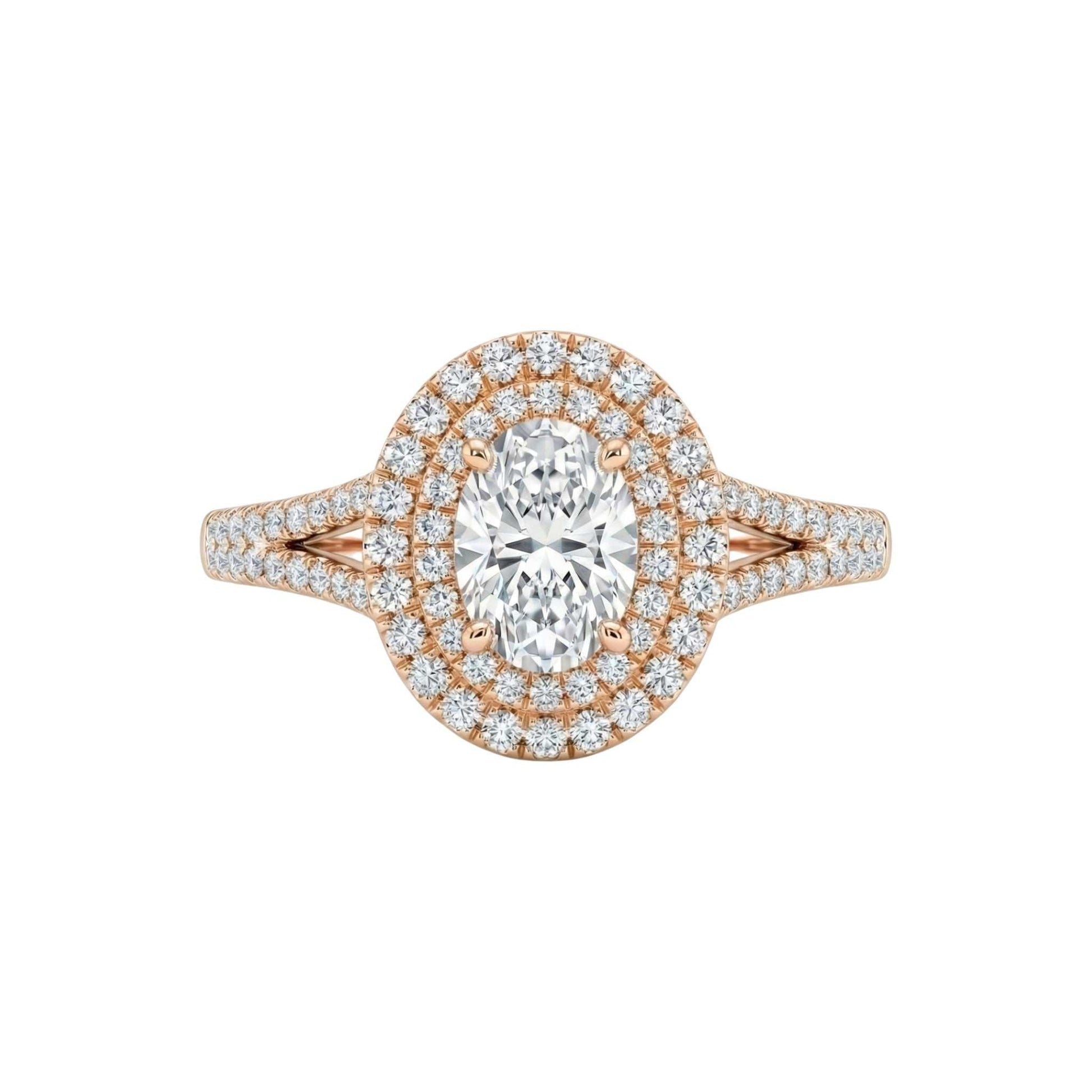 Rose gold ring with a large central diamond and smaller diamonds around on a white background