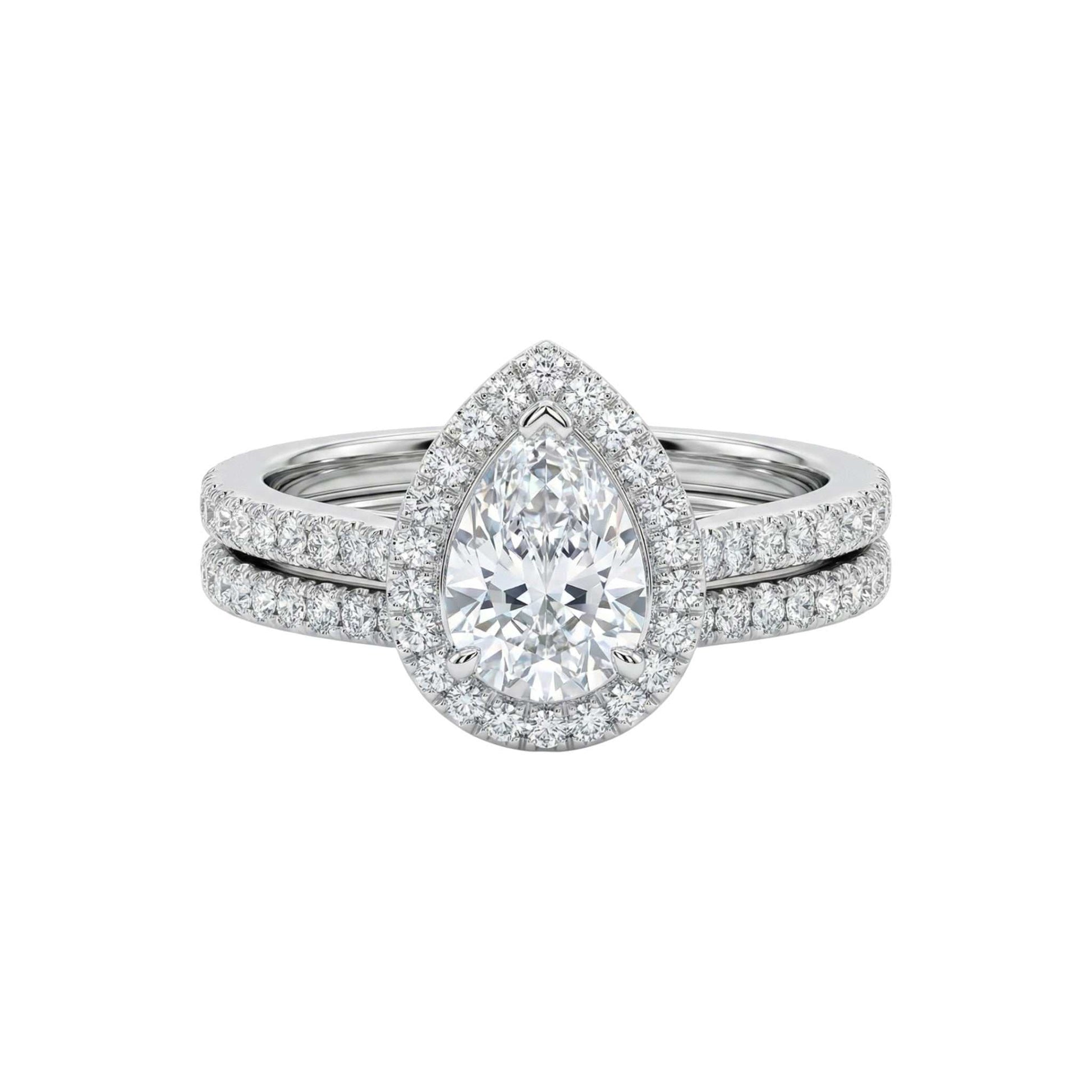 Laila Pear Cut CZ Bridal Set featuring pear-shaped cubic zirconia and pavé wedding band in 18KT gold