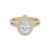 Mariam Pear Cut Moissanite bridal set with pear-shaped moissanite center and diamond halo in 18K gold ring