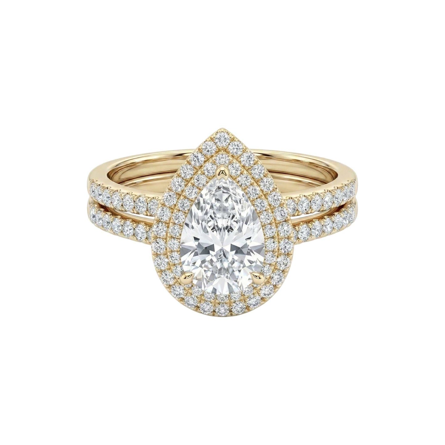 Mariam Pear Cut Moissanite bridal set with pear-shaped moissanite center and diamond halo in 18K gold ring