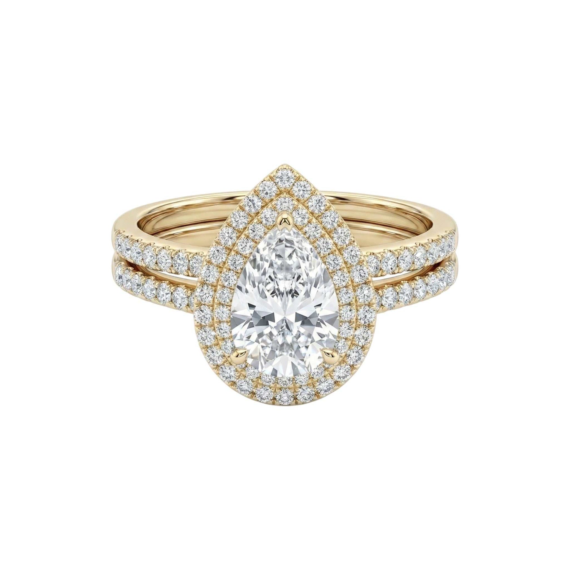 Mariam Pear Cut Moissanite bridal set with pear-shaped moissanite center and diamond halo in 18K gold ring
