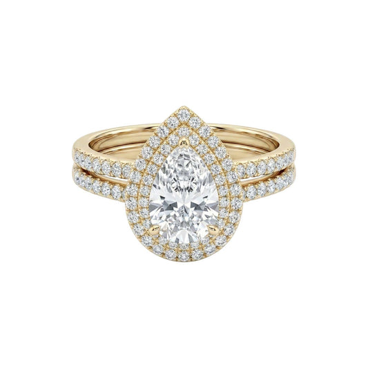 Mariam Pear Cut Moissanite bridal set with pear-shaped moissanite center and diamond halo in 18K gold ring