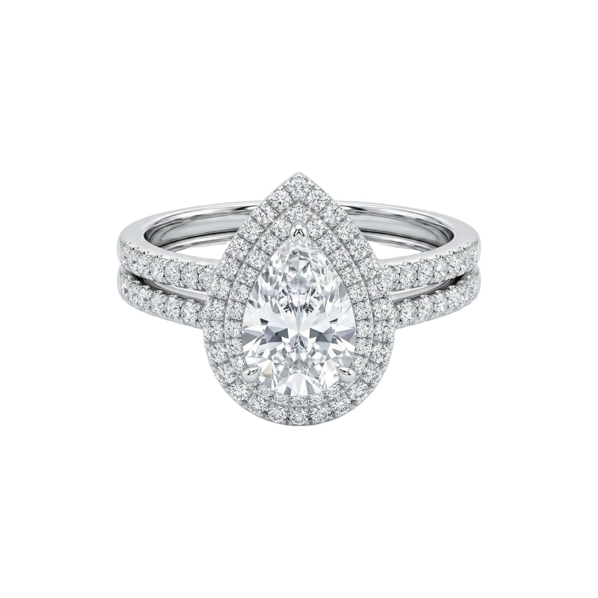 Diamond ring with a pear-shaped center stone on a white background