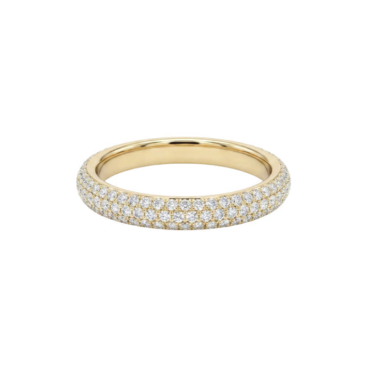 Gold ring with embedded diamonds on a white background