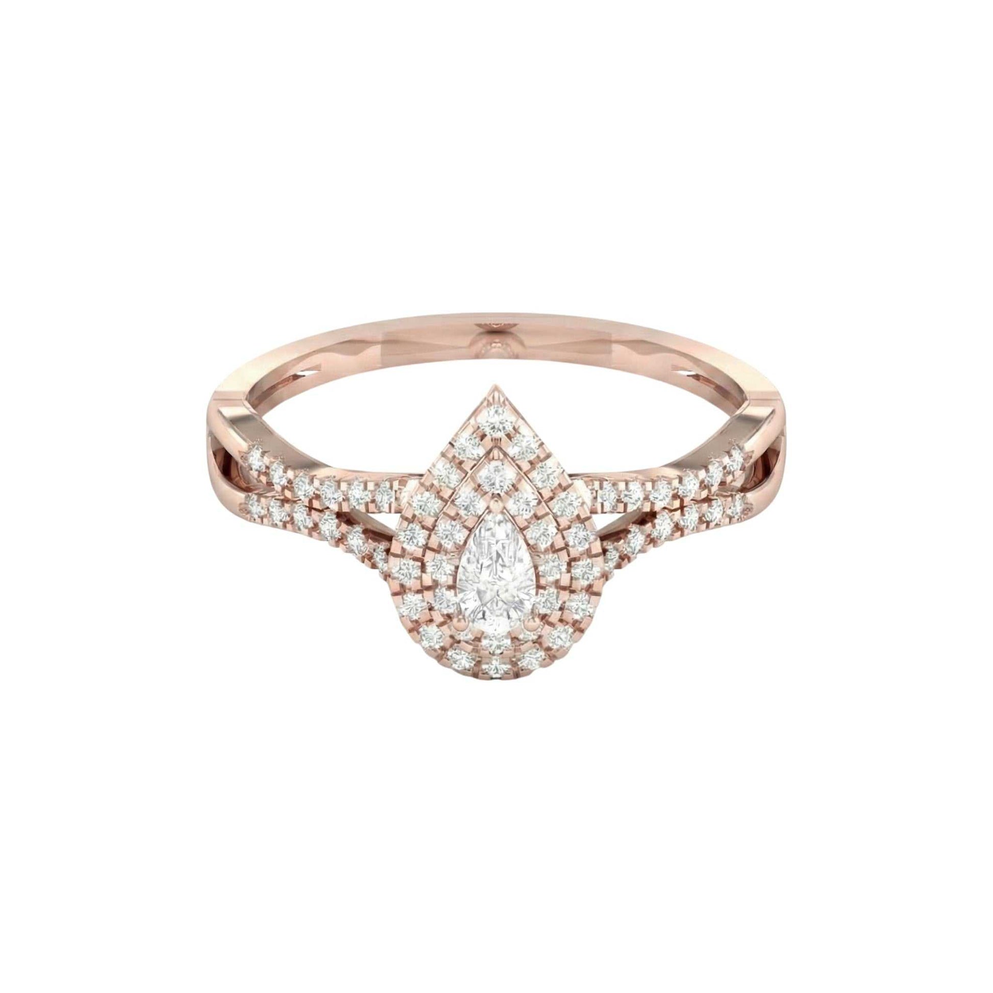 Rose gold ring with a diamond teardrop design on a white background