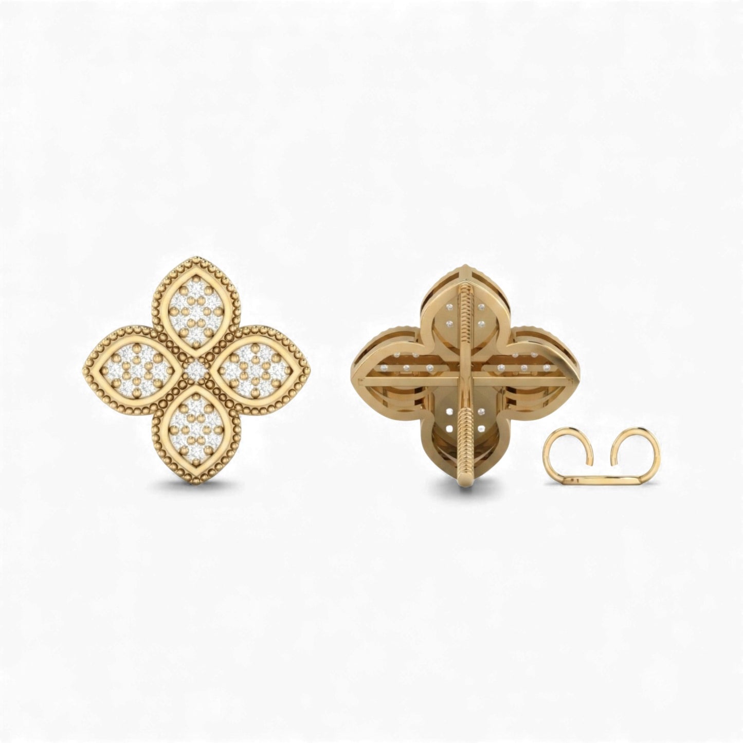 Gold earrings with intricate designs on a white background