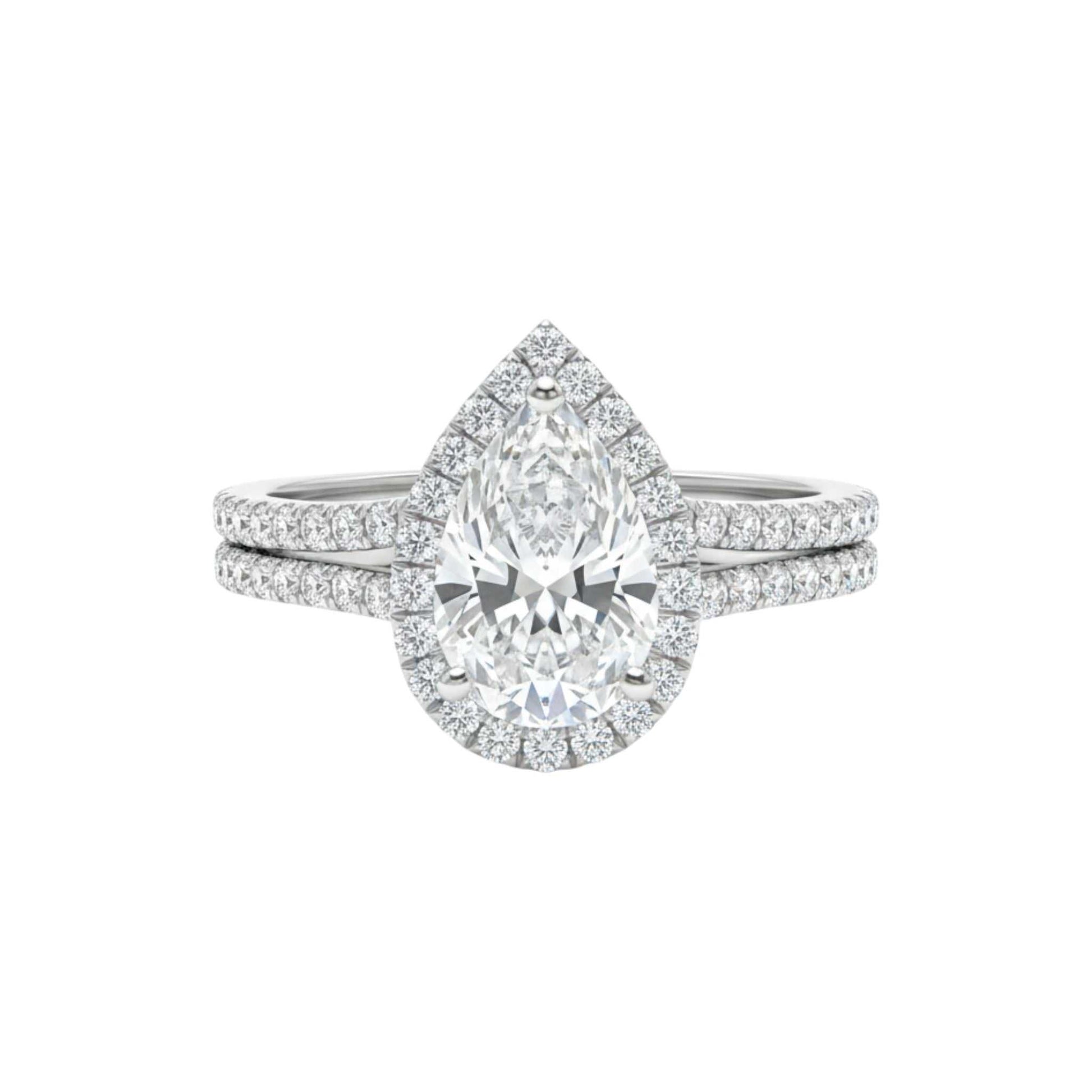 Ola Pear Cut Moissanite bride set in 925 sterling silver with pear-shaped center stone and pavé accents