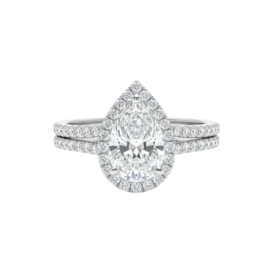 Diamond ring with a pear-shaped center stone on a white background